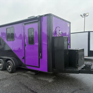 Legacy Series 7x16 purple and black pet grooming trailer with generator, electric grooming table, Flying Pig tub, awning, and SDG Premier Package for sale.