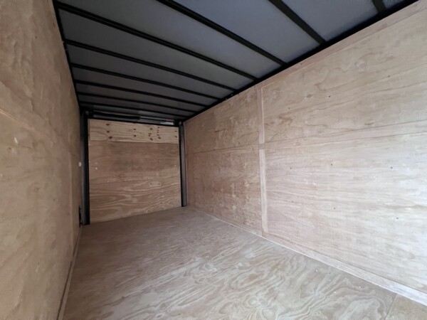 inside a black 7x16 spartan cargo trailer