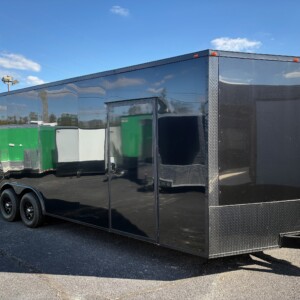 Deep South 8.5x24 black enclosed car hauler trailer with polycore exterior, blackout package, escape door, mag wheels, and 7'6" interior height for sale.