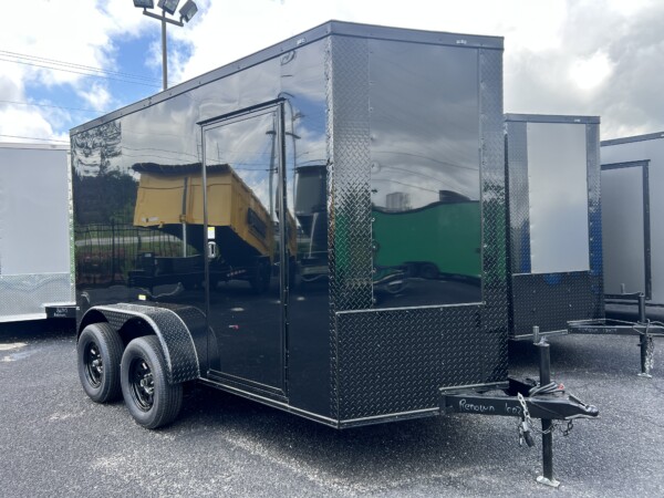 JC 6x12TA Enclosed Trailer – Blackout & .080 PolyCore Exterior for sale at Renown Cargo Trailers