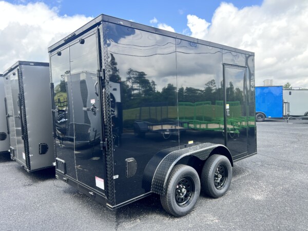 JC 6x12TA Enclosed Trailer – Blackout & .080 PolyCore Exterior for sale at Renown Cargo Trailers