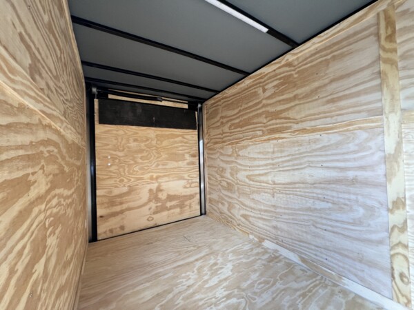 JC 6x12TA Enclosed Trailer – Blackout & .080 PolyCore Exterior for sale at Renown Cargo Trailers