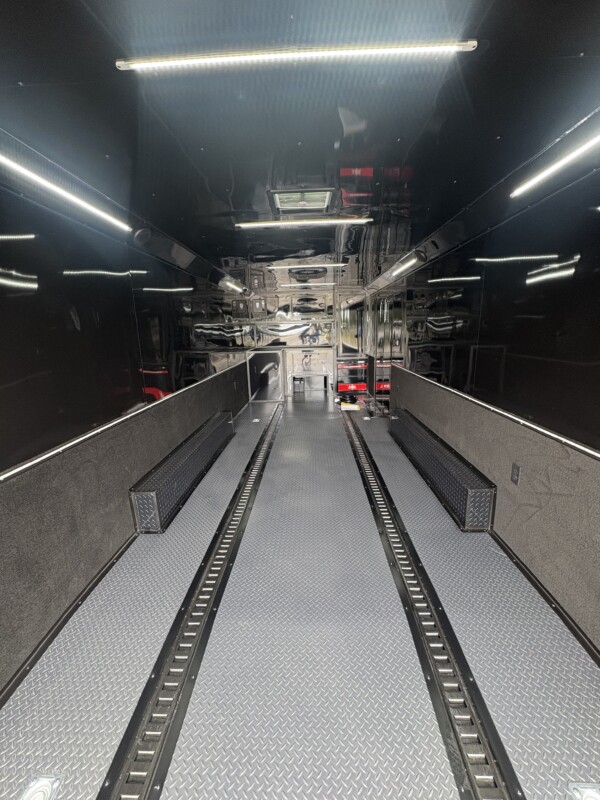 Experience premium hauling with the Spartan Cargo S8.5x24TA Race Car Trailer—fully loaded with gullwing doors, high-end features, and race-ready performance.