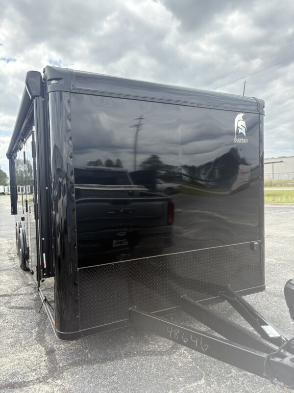 Experience premium hauling with the Spartan Cargo S8.5x24TA Race Car Trailer—fully loaded with gullwing doors, high-end features, and race-ready performance.
