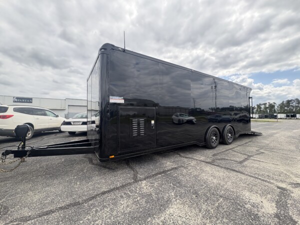 Experience premium hauling with the Spartan Cargo S8.5x24TA Race Car Trailer—fully loaded with gullwing doors, high-end features, and race-ready performance.