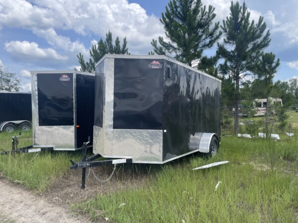 Rock Solid Enclosed Cargo Trailer for Sale in Black, Semi screwless, sidewall vents with great features! Pick yours up today or purchase online and request delivery