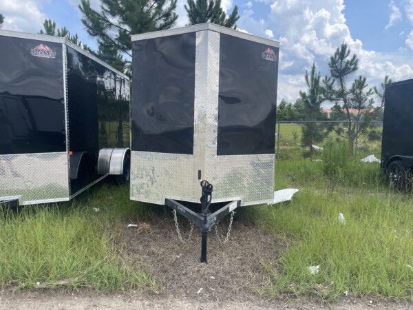 Rock Solid Enclosed Cargo Trailer for Sale in Black, Semi screwless, sidewall vents with great features! Pick yours up today or purchase online and request delivery
