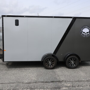 Rock Solid 7x16 Harley Edition motorcycle enclosed trailer with blackout package, Harley decals, RTP flooring, Eagle wheels, and torsion axles.