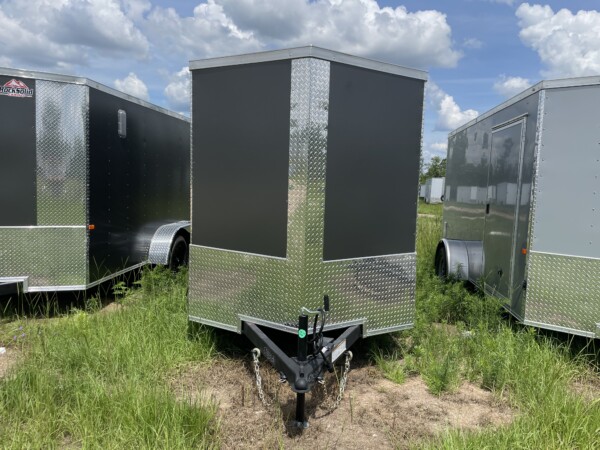6x12 Tandem Axle Charcoal Polycore Enclosed Cargo Trailer by Rock Solid Cargo. Ready for pick up or delivery. Call today
