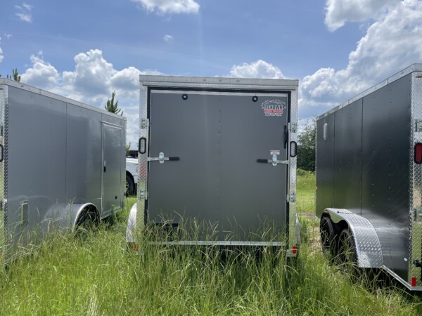 6x12 Tandem Axle Charcoal Polycore Enclosed Cargo Trailer by Rock Solid Cargo. Ready for pick up or delivery. Call today