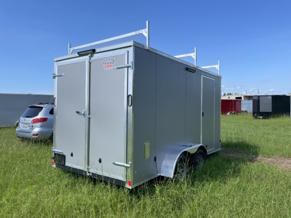 Contractor-ready 7x14 Rock Solid enclosed trailer with triple ladder rack, aluminum access ladder, Polycore skin, 7ft interior, LED flood lights, and barn doors. $6,999 – Stock #67843. Built to work as hard as you do.