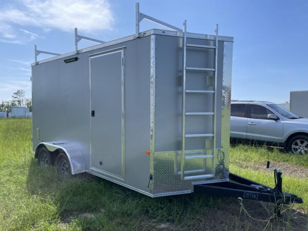 Contractor-ready 7x14 Rock Solid enclosed trailer with triple ladder rack, aluminum access ladder, Polycore skin, 7ft interior, LED flood lights, and barn doors. $6,999 – Stock #67843. Built to work as hard as you do.