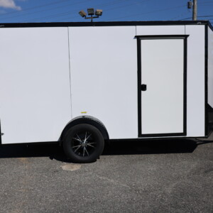 Deep South 6x12 enclosed trailer with white Polycore exterior, blackout package, alloy wheels, spoiler, and ramp door.
