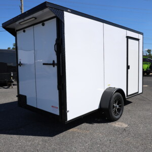 Deep South 6x12 black enclosed cargo trailer with Polycore exterior, blackout package, alloy wheels, spoiler, and ramp door.