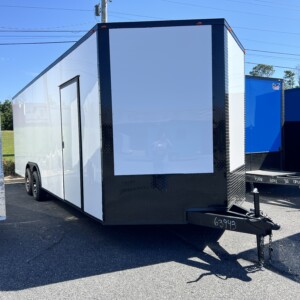 White Deep South 8.5x24 tandem axle enclosed cargo trailer with blackout package, escape door, mag wheels, ramp door, and Polycore exterior.