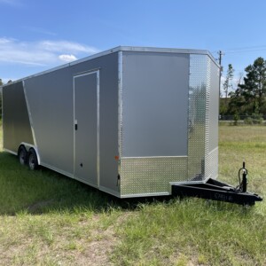 Silver Frost and Charcoal 8.5x24 tandem axle custom enclosed trailer with Polycore exterior, torsion axles, rear spoiler, D-rings, and ramp door