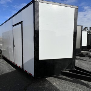 Deep South 8.5x28 enclosed car hauler with Polycore exterior, blackout package, escape door, spoiler, and upgraded 7000 lb axles.