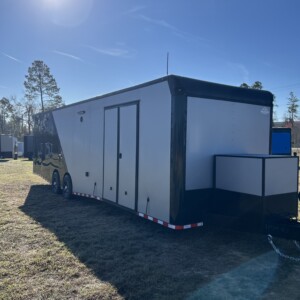 8.5x32 tandem axle race trailer in Silver Frost and Black two-tone with blackout package, cabinets, E-Track, air conditioning, and torsion axles
