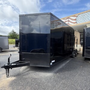 Deep South 8.5x24 triple axle enclosed car hauler trailer with black blackout package, alloy wheels, Polycore semi-screwless exterior, escape door, and 7'6" interior height.