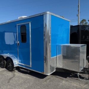True Blue Genesis Series 7x14 pet grooming trailer with Flying Pig tub, generator compartment, mag wheels, water tanks, and mobile grooming setup.