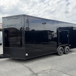 Deep South 8.5x20 tandem axle enclosed cargo trailer with white Polycore exterior, blackout package, alloy wheels, escape door, rear spoiler with LED light, and heavy-duty ramp door
