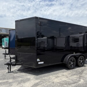 Deep South 7x14 tandem axle enclosed cargo trailer with V-nose design, rear ramp door, side entry door, tandem axles, LED lighting, and durable enclosed construction for hauling equipment, ATVs, motorcycles, and cargo.