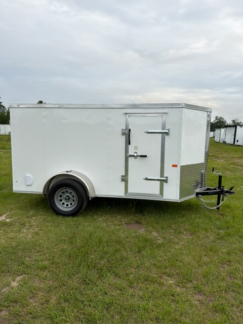 White Rock Solid Cargo 5x10 single axle enclosed cargo trailer with factory side door, bar lock, V-nose design, and ramp door