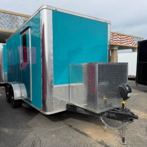 Water Blue Genesis Series 7x14 pet grooming trailer with Flying Pig tub, generator compartment, mag wheels, water tanks, and mobile grooming setup.