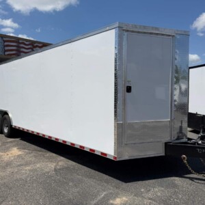 Rock Solid Cargo 8.5x32 triple axle enclosed cargo trailer with white poly exterior, steel floor, torsion axles, vertical E-track, and heavy-duty cargo hauling package.