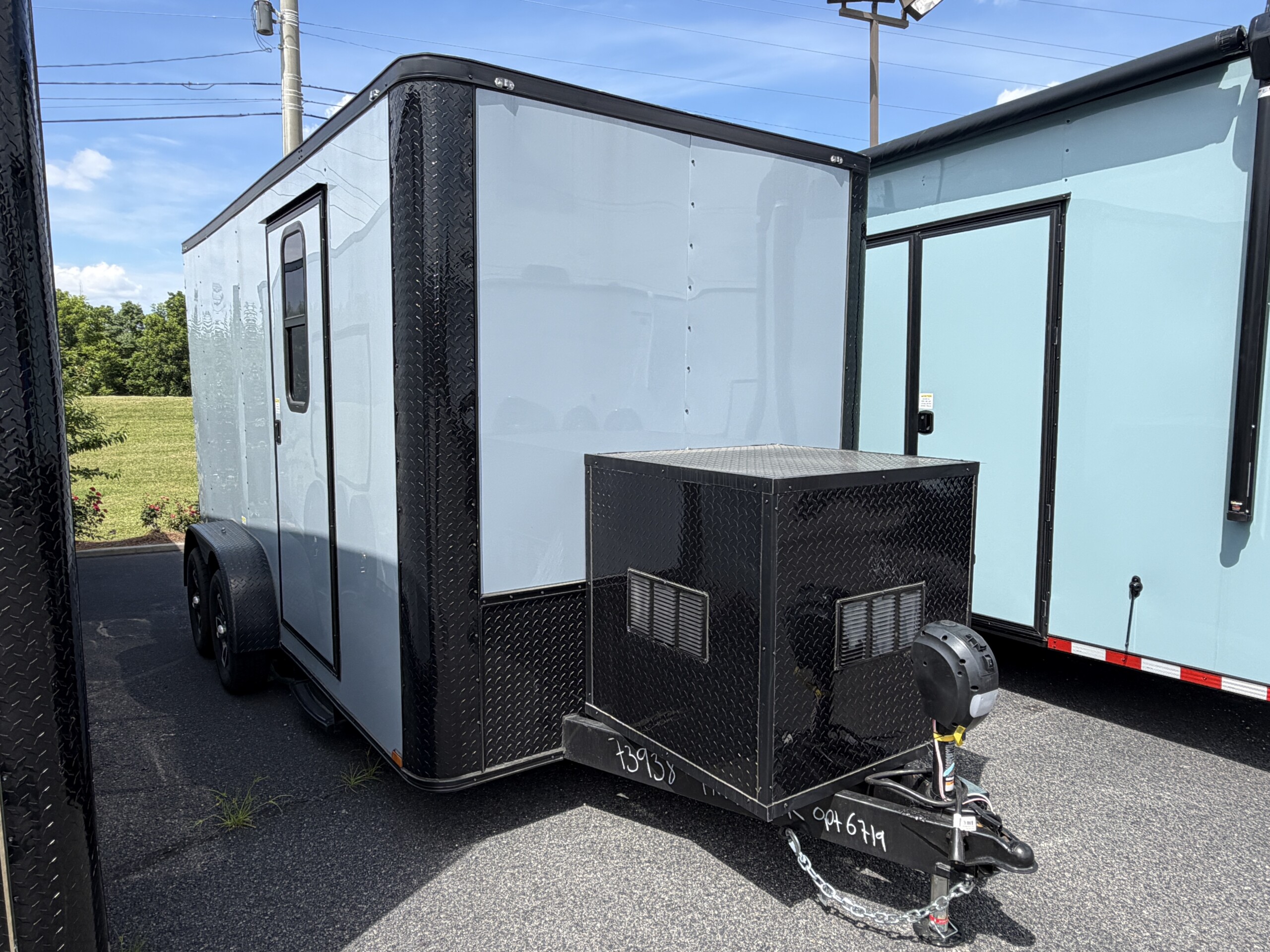 7x14 Genesis Series pet grooming trailer with Polar Silver exterior, blackout package, generator box, upgraded flooring, and professional mobile grooming setup.