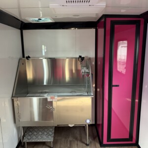 7x14 White Genesis Series Pet Grooming Trailer with 50 inch Flying Pig tub and full grooming equipment for sale.