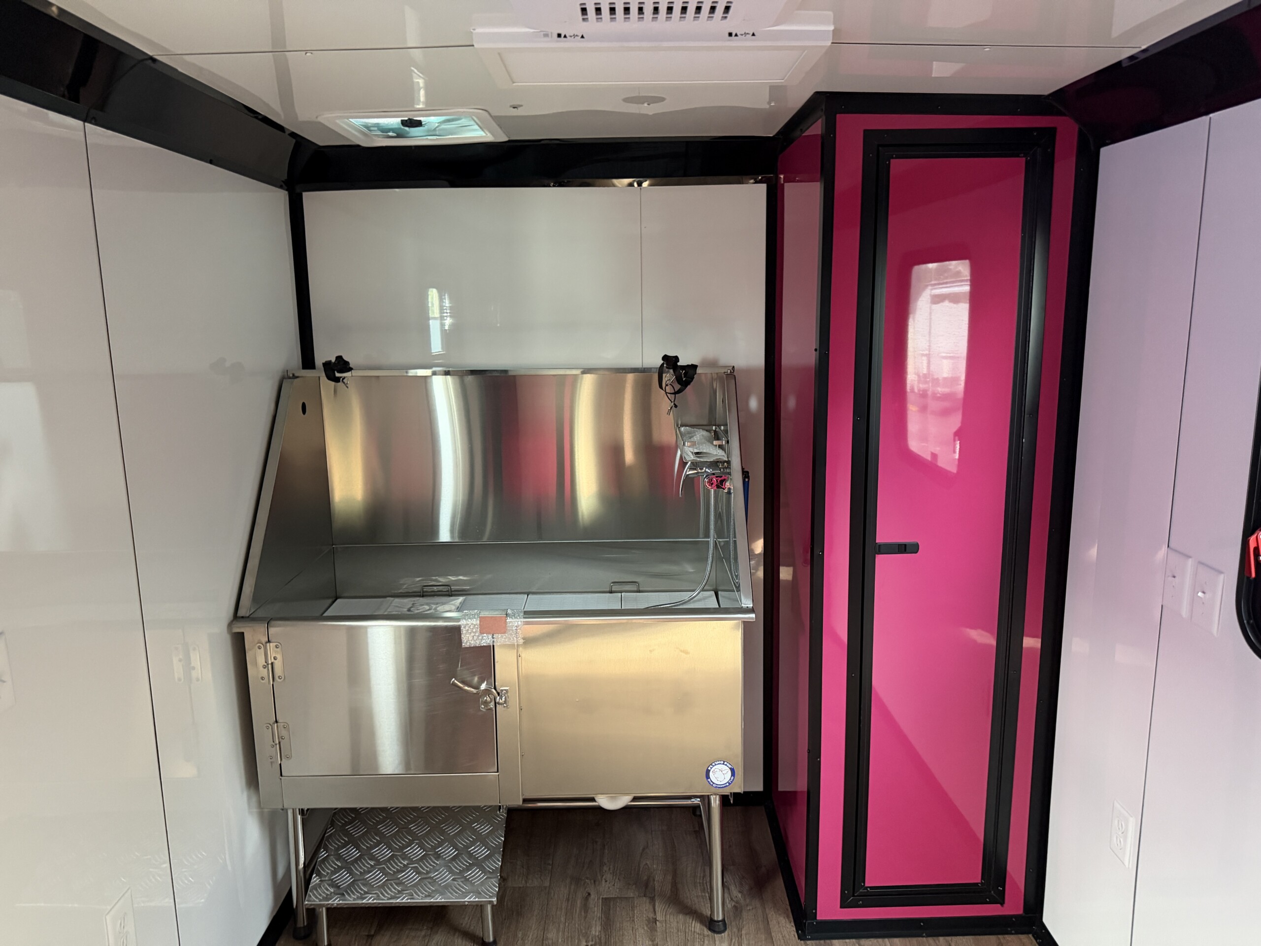 7x14 White Genesis Series Pet Grooming Trailer with 50 inch Flying Pig tub and full grooming equipment for sale.