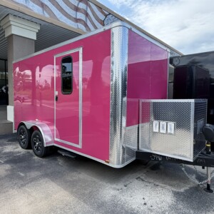 Hot pink Genesis 7x14 pet grooming trailer with chrome trim and blackout package, featuring a 50 inch Flying Pig tub, generator box, and alloy wheels