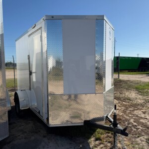 Diamond Cargo 5x10 enclosed cargo trailer with Polycore exterior, V-nose design, ramp door, LED lights, and silver modular wheels.