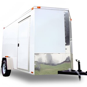 Diamond Cargo 6x10 enclosed trailer with Polycore exterior, V-nose design, ramp door, LED lighting, and silver modular wheels.