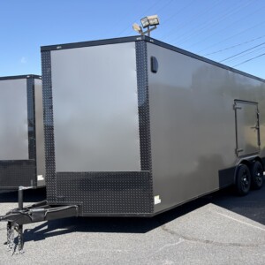 Charcoal gray Deep South 8.5x20 tandem axle enclosed cargo trailer with blackout trim, alloy wheels and rear spoiler.