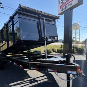 Black Panther Cargo 7x16 tandem axle dump trailer with 4-foot steel walls, heavy-duty steel dump bed, rear barn doors and tarp system.
