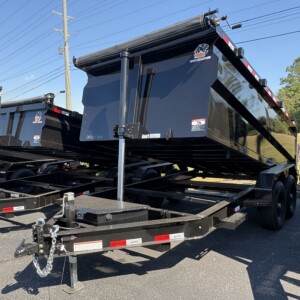 Panther Cargo 7x14 tandem axle 14K dump trailer with 4-foot high steel walls, heavy-duty steel dump bed, rear barn doors and tarp system.