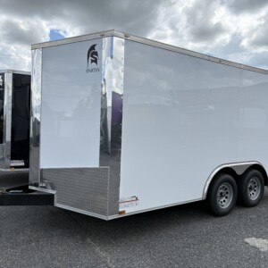 Spartan Cargo 8.5x14 tandem axle enclosed cargo trailer with V-nose, rear ramp door, aluminum exterior and 6-inch tubular frame.