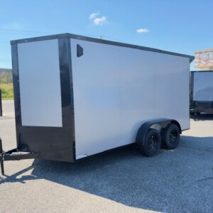 Silver Frost J&C Cargo 7x14 tandem axle enclosed cargo trailer with blackout trim, black modular wheels, Poly exterior and rear spoiler.